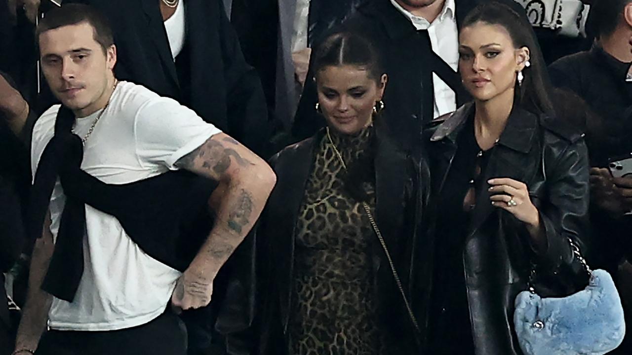 Selena Gomez's Edgy Look: Leather Dress And Boots Selena Gomez's Edgy Look: Leather Dress And Boots
